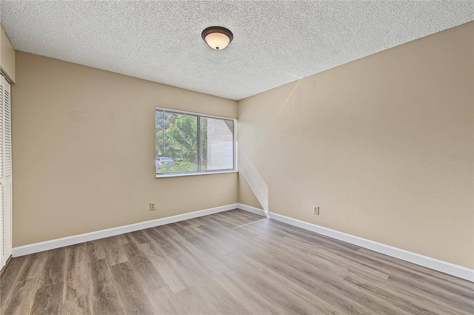 2729 FOXFIRE COURT, #C, Clearwater, FL 33761 Upstairs bedroom, Laminate Flooring