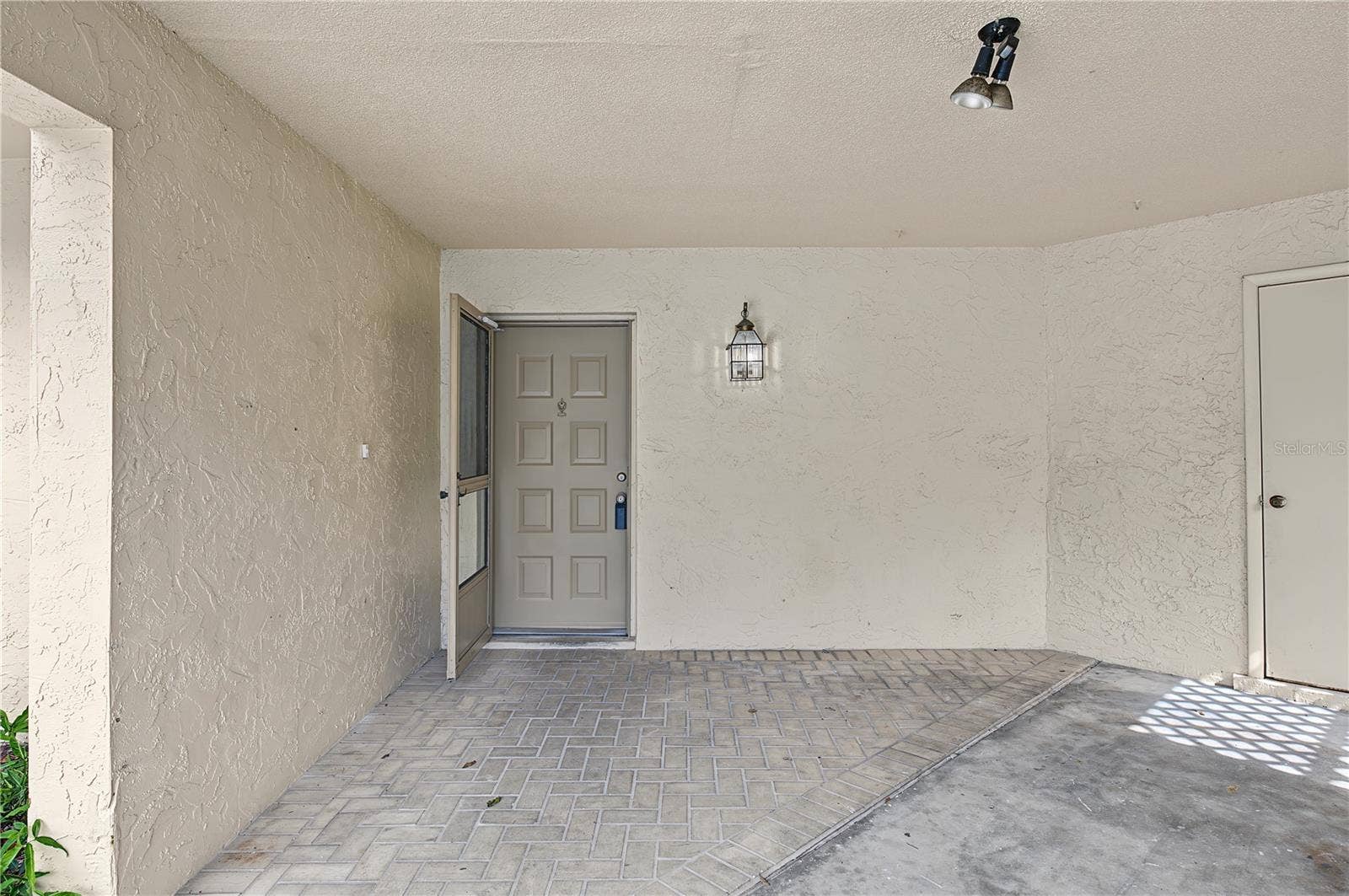 2729 FOXFIRE COURT, #C, Clearwater, FL 33761 Carport and storage area covered - other parking spots available
