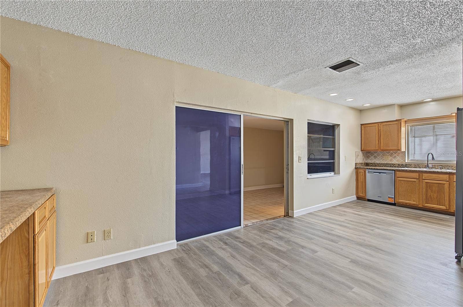 2729 FOXFIRE COURT, #C, Clearwater, FL 33761 Patio off to the side of the kitchen
