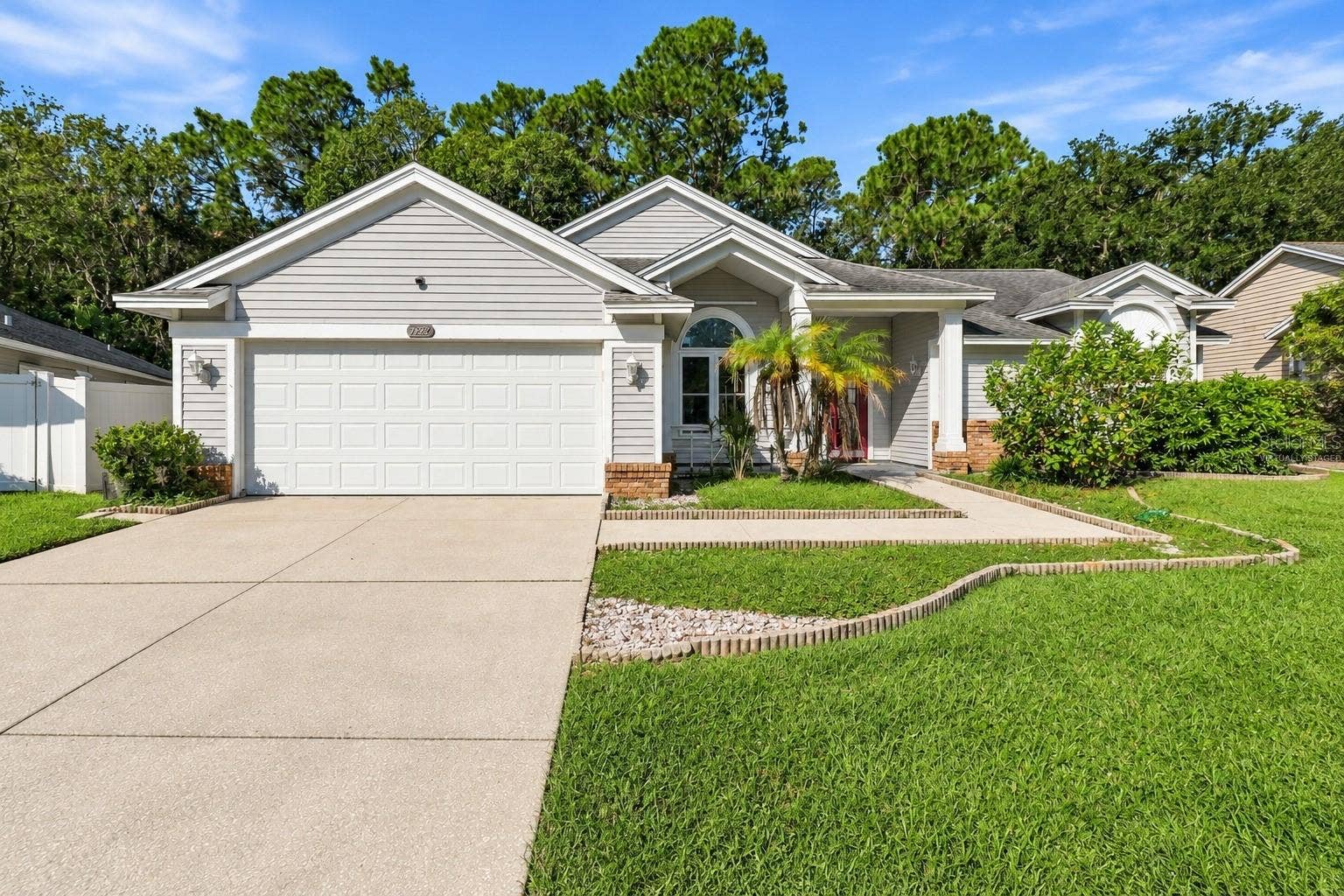 7828 LAKE PLACID LANE, New Port Richey, FL 34655 Virtually staged