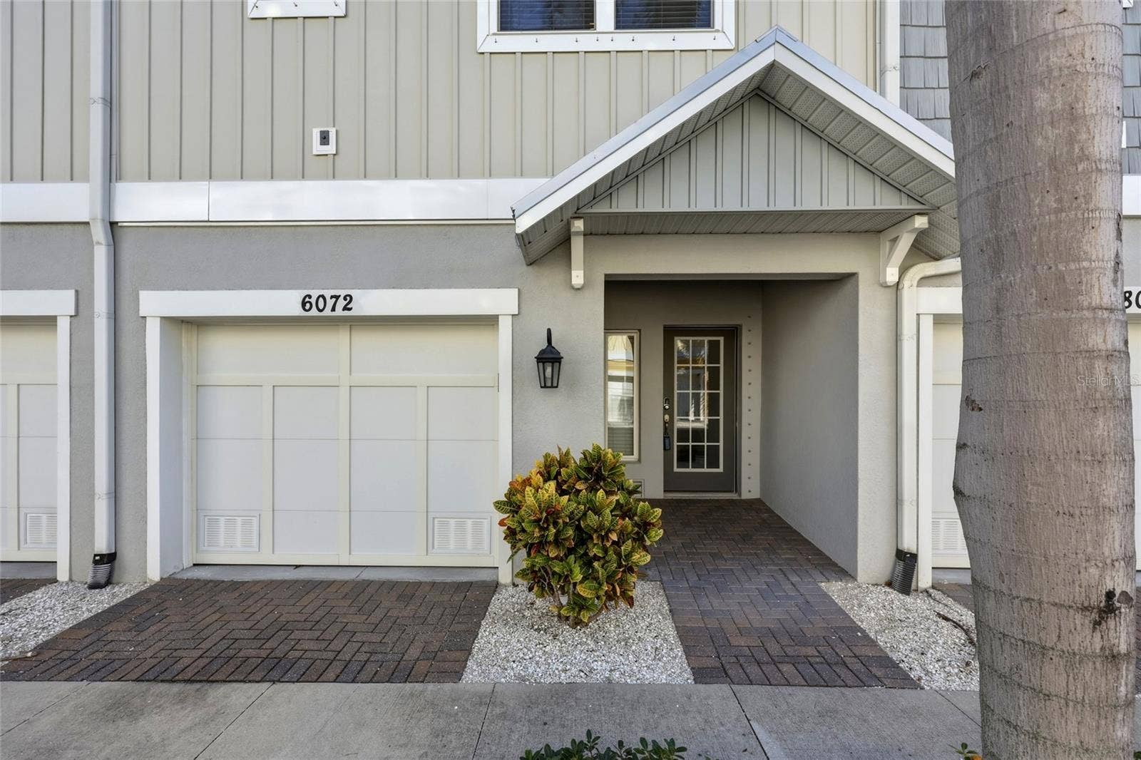 6072 MOORINGS DRIVE S, St Petersburg, FL 33712 Front door/2.5 car garage