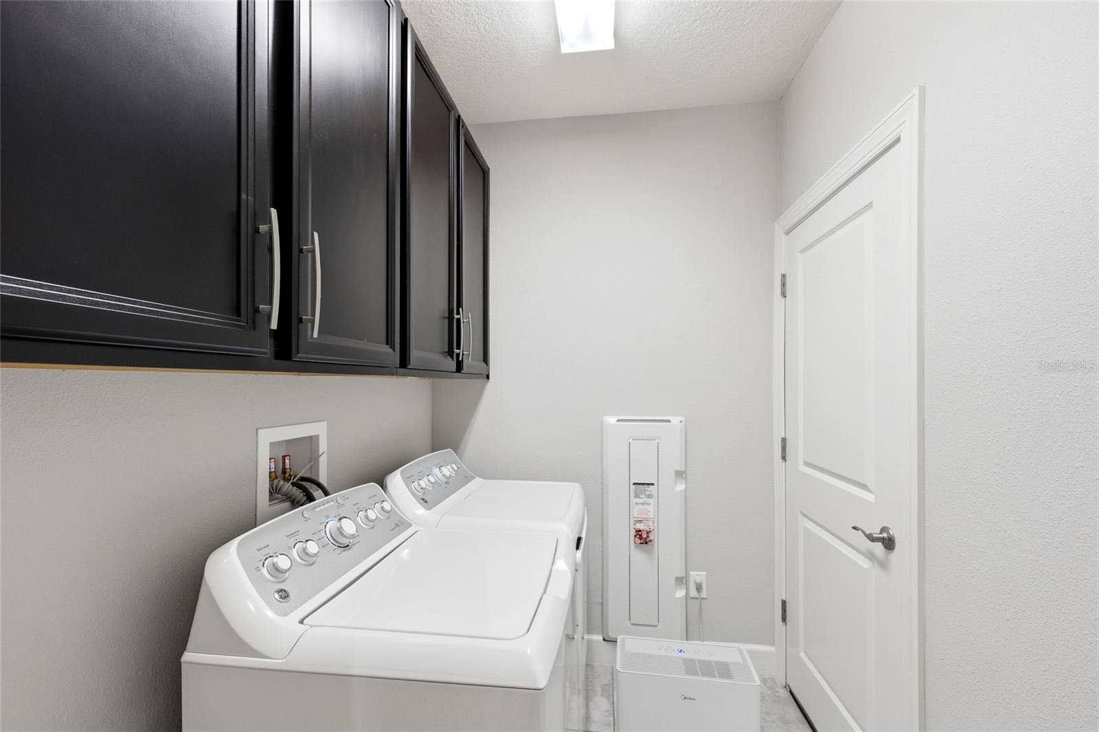 6072 MOORINGS DRIVE S, St Petersburg, FL 33712 3 story laundry room