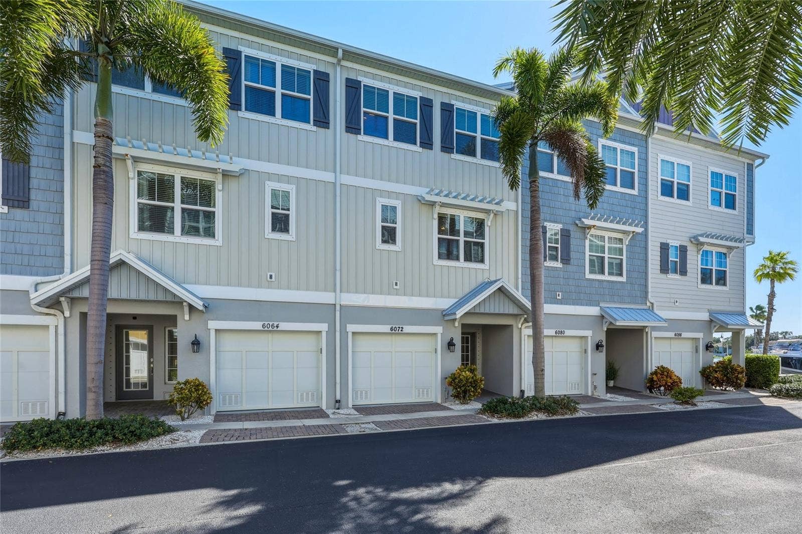 6072 MOORINGS DRIVE S, St Petersburg, FL 33712 Front of the townhouse - 3 stories