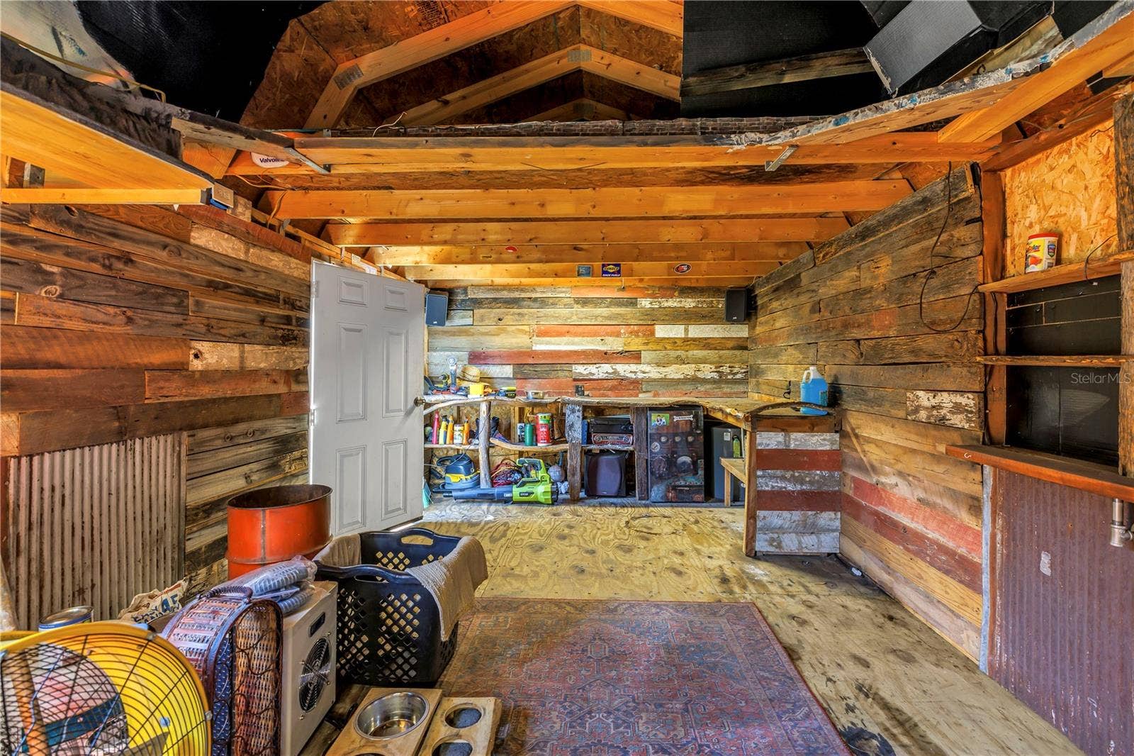 FYI the reclaimed barn wood paneling does not convey.