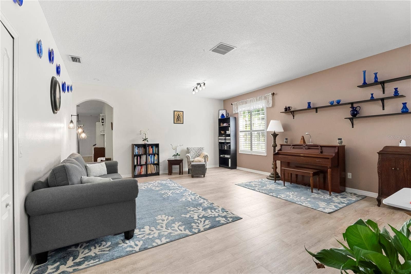 8121 BRINEGAR CIRCLE, Tampa, FL 33647 Living Room: Plantation Shutters