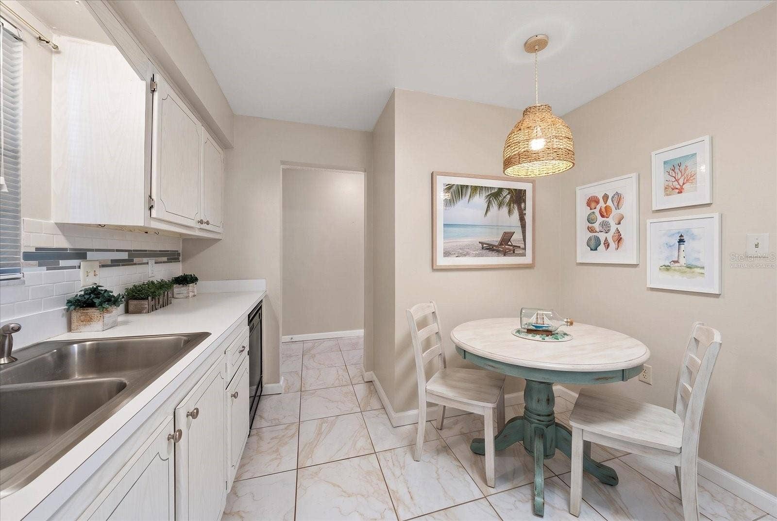 1706 BELLEAIR FOREST DRIVE, #238, Belleair, FL 33756 Kitchen with dining space virtually staged