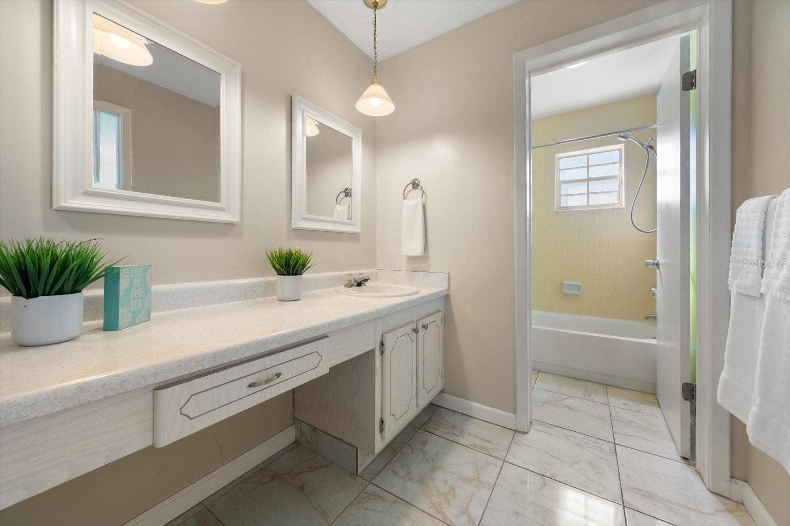 1706 BELLEAIR FOREST DRIVE, #238, Belleair, FL 33756 Primary en suite bath with vanity