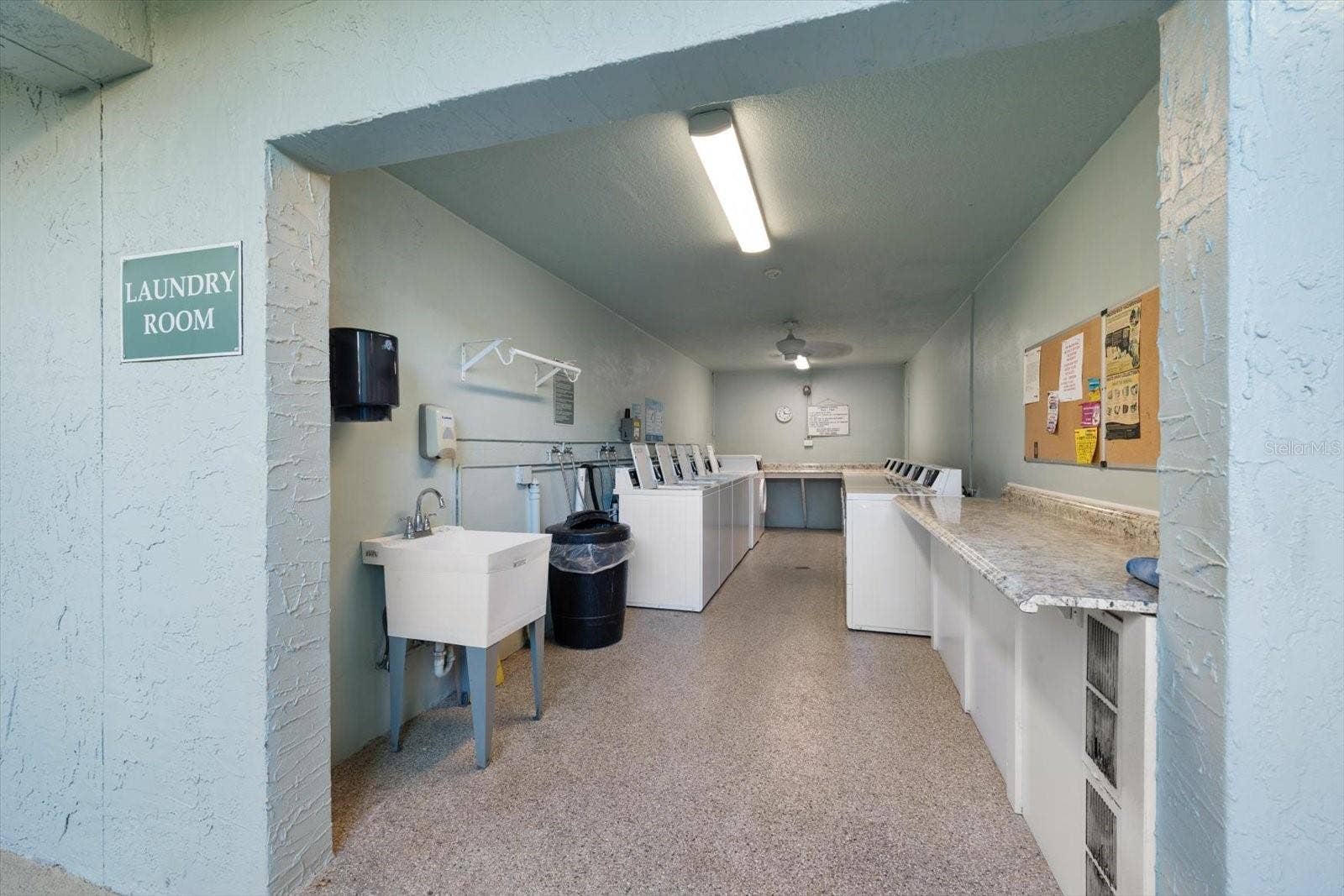 1706 BELLEAIR FOREST DRIVE, #238, Belleair, FL 33756 Ground floor laundry facility, sparkllng clean!