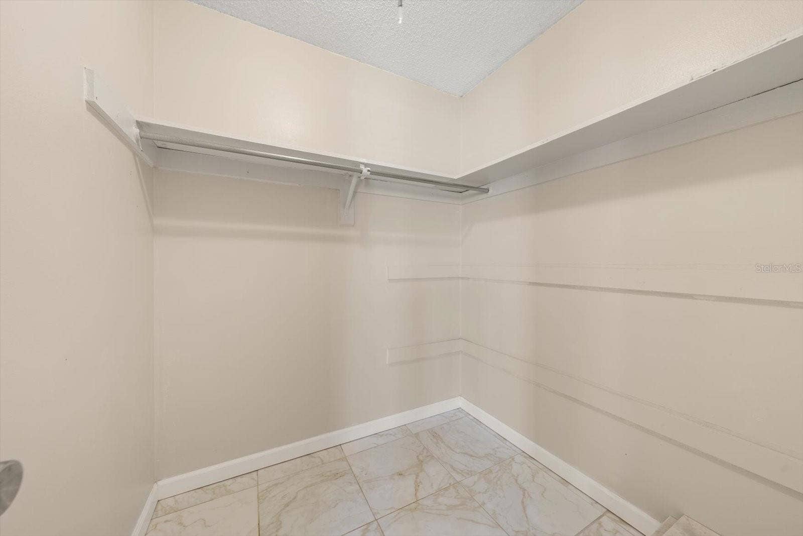 1706 BELLEAIR FOREST DRIVE, #238, Belleair, FL 33756 Primary suite walk in closet