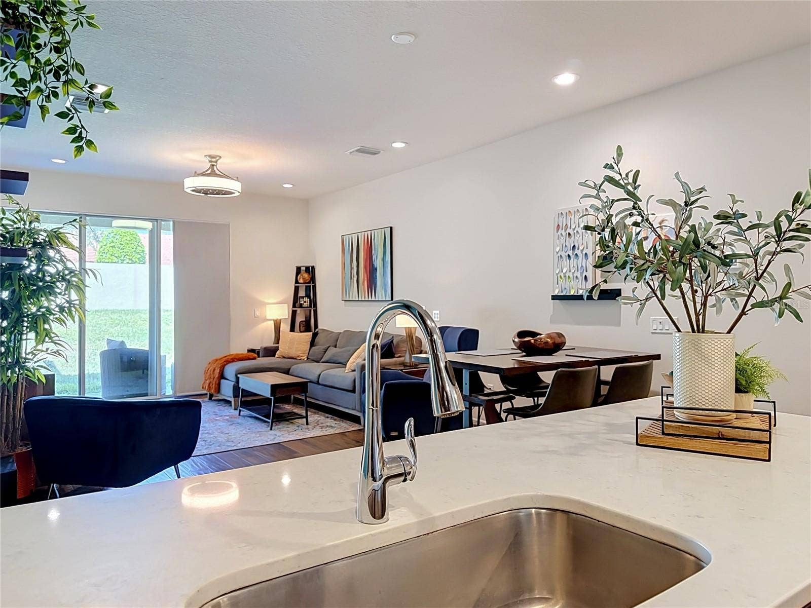 2270 MONTVIEW DRIVE, Clearwater, FL 33763 The well-appointed kitchen offers SOLID WOOD CABINETRY, GRANITE countertops, stainless steel appliances, a breakfast bar, and ample storage.