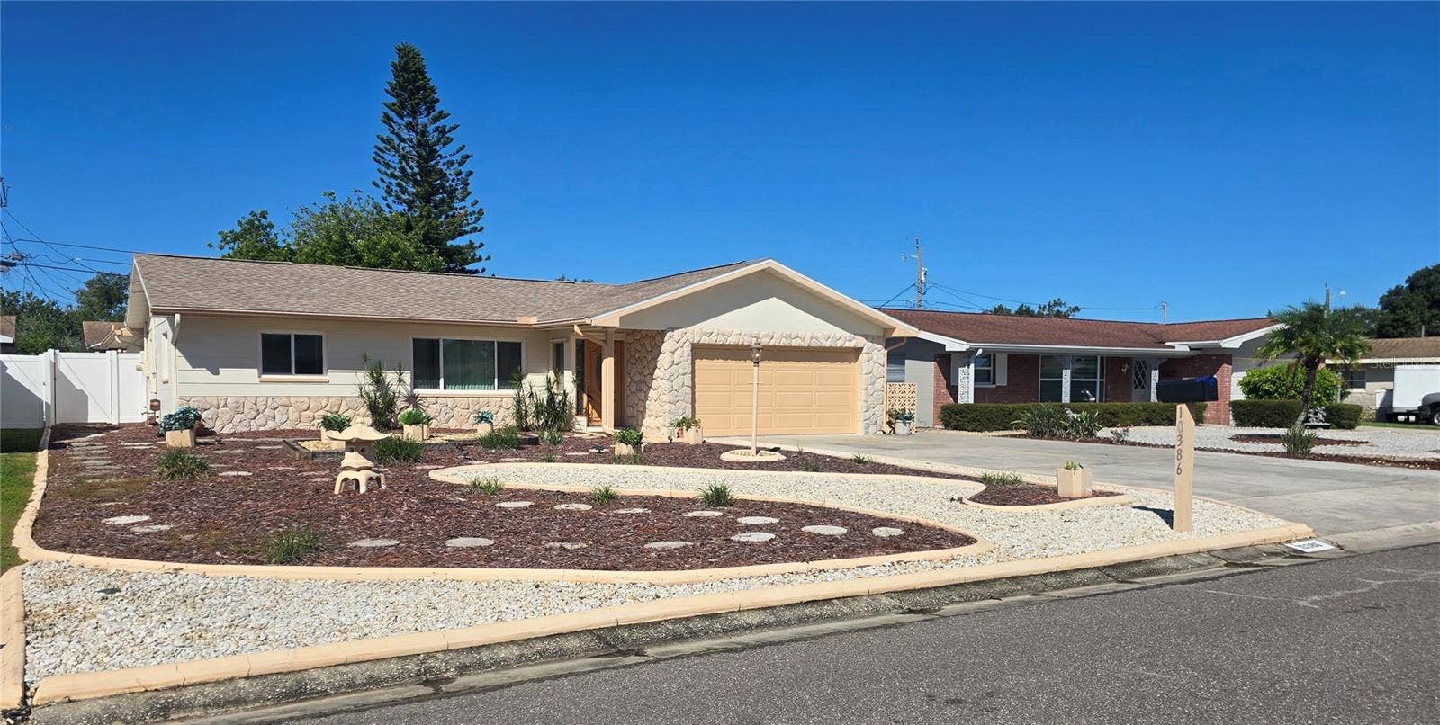 10386 112TH WAY N, Seminole, FL 33778 This home features a huge driveway and a maintenance free yard