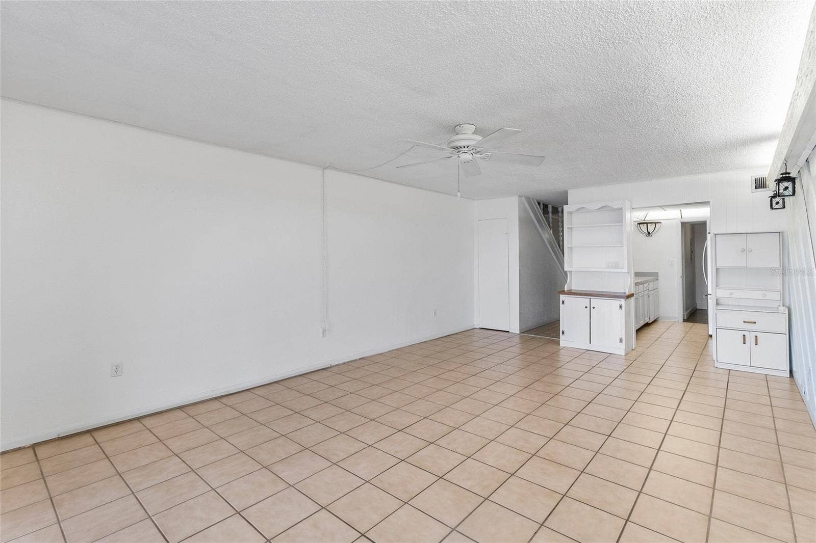 2980 HAINES BAYSHORE ROAD, #105, Clearwater, FL 33760 Living area looking toward kitchen