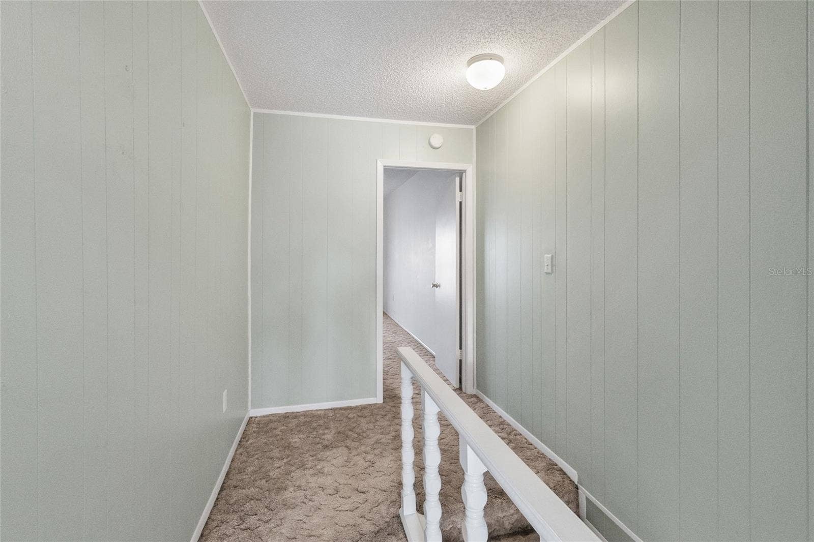 2980 HAINES BAYSHORE ROAD, #105, Clearwater, FL 33760 Stairway looking toward primary suite