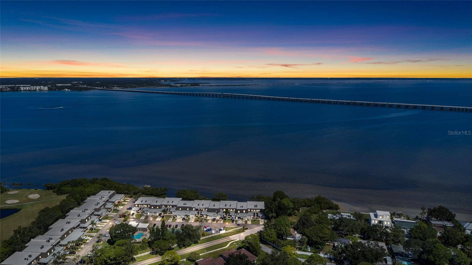 2980 HAINES BAYSHORE ROAD, #105, Clearwater, FL 33760 Twilight view over the bay