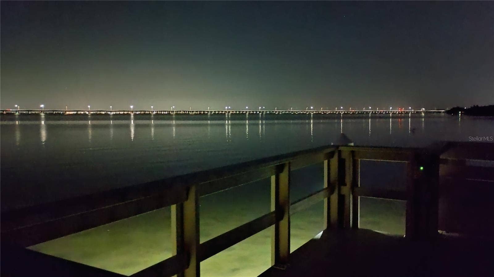 2980 HAINES BAYSHORE ROAD, #105, Clearwater, FL 33760 Tampa Bay nigh lights from private community dock