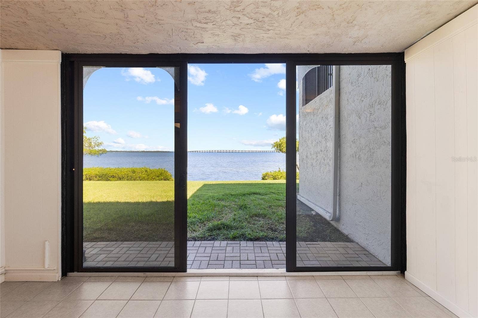 2980 HAINES BAYSHORE ROAD, #105, Clearwater, FL 33760 Sunroom - off living area with full water view