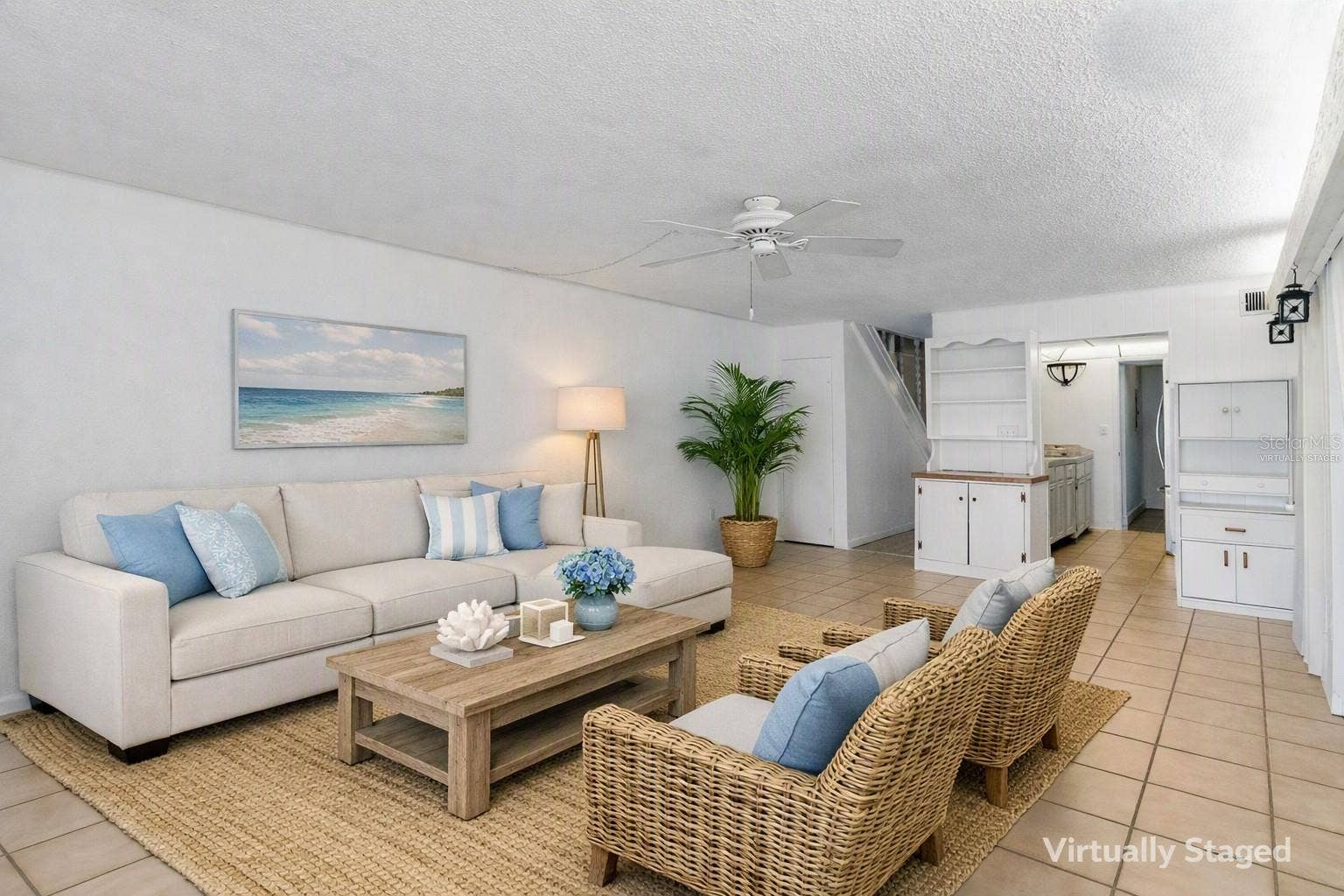 2980 HAINES BAYSHORE ROAD, #105, Clearwater, FL 33760 Virtually staged living area looking toward kitchen