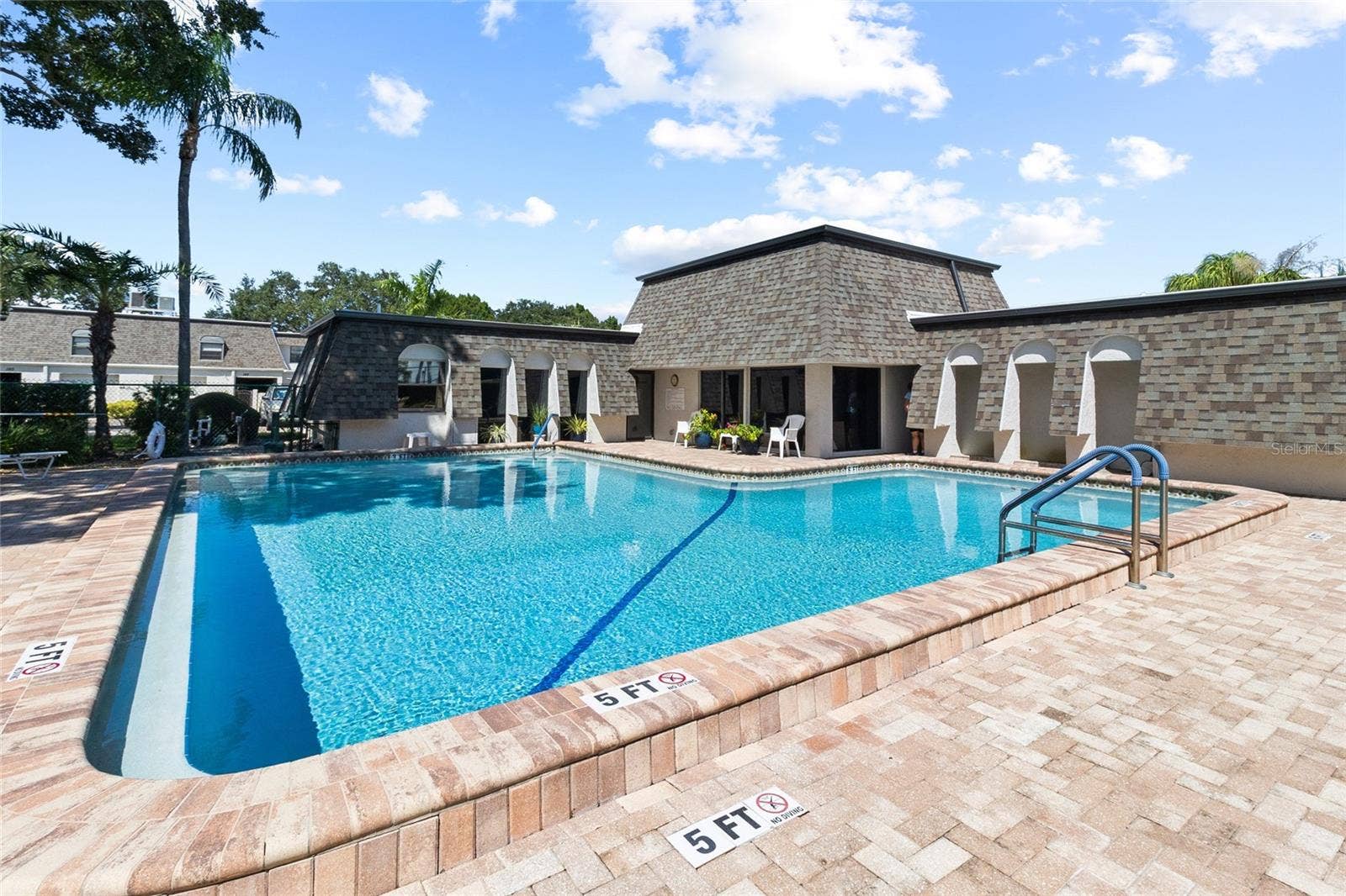 2980 HAINES BAYSHORE ROAD, #105, Clearwater, FL 33760 Pool area - looking toward club house