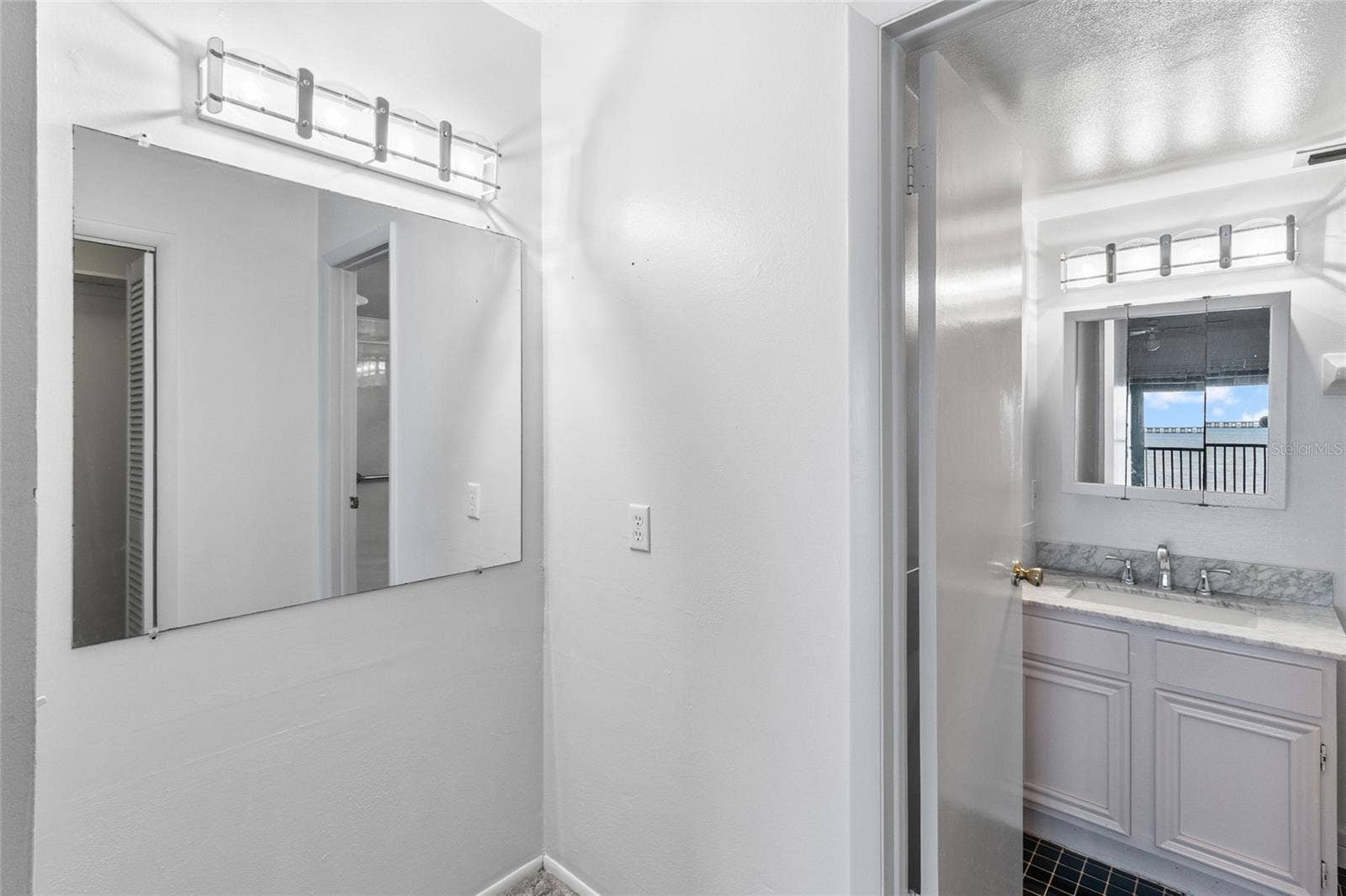 2980 HAINES BAYSHORE ROAD, #105, Clearwater, FL 33760 Dressing area looking toward primary suite