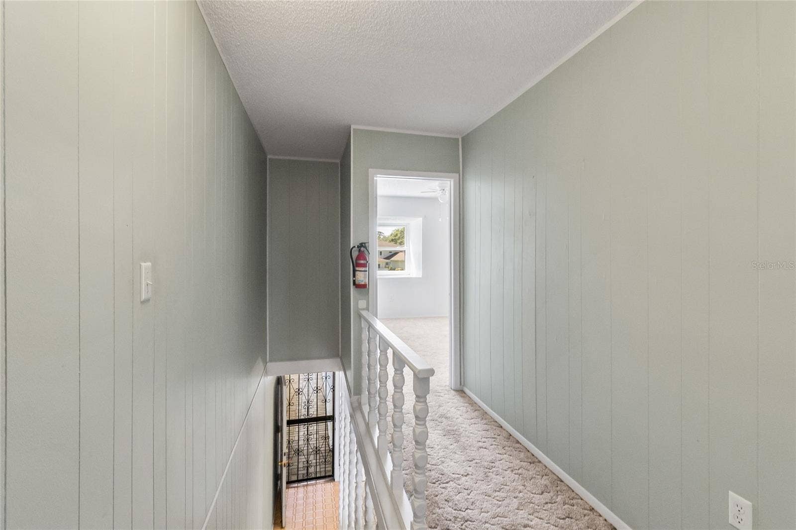 2980 HAINES BAYSHORE ROAD, #105, Clearwater, FL 33760 Stairway looking down to main level