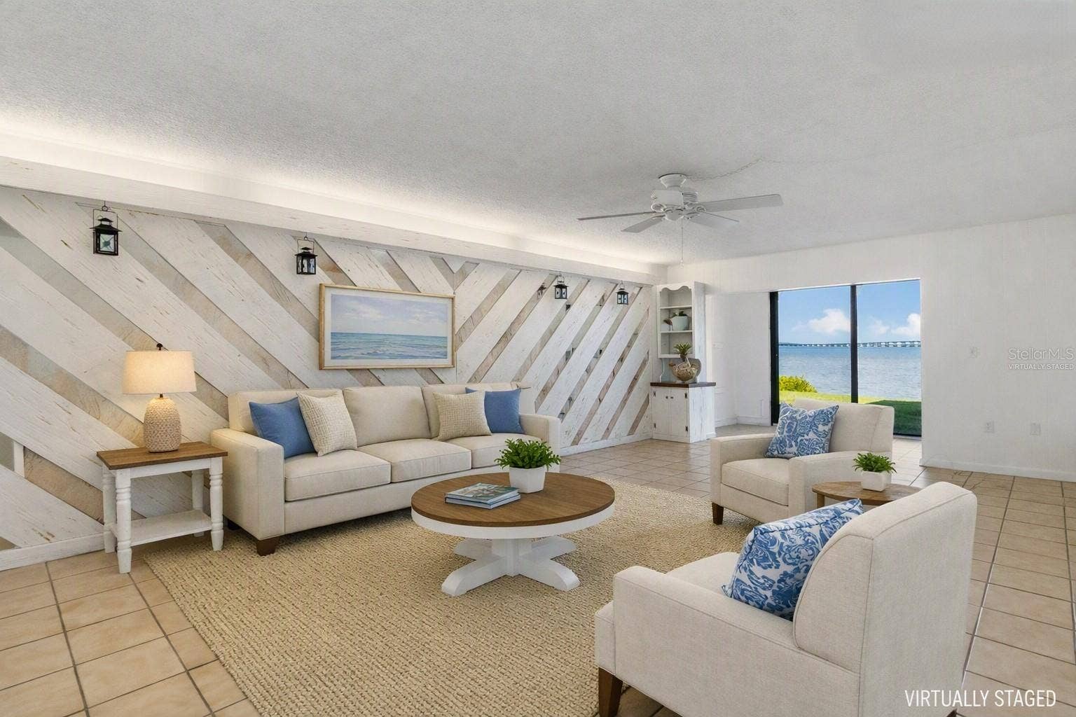 2980 HAINES BAYSHORE ROAD, #105, Clearwater, FL 33760 Virtually staged living area over looking water view