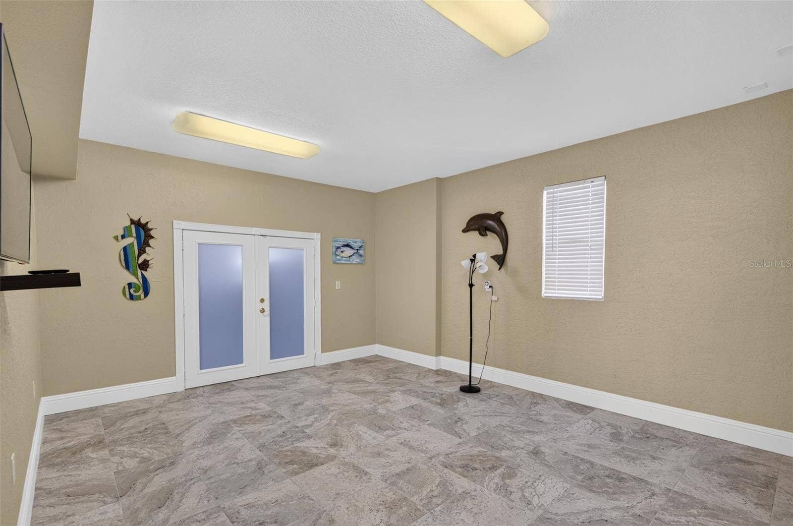 17021 DOLPHIN DRIVE, North Redington Beach, FL 33708 BONUS AREA DOORS TO WEST GARAGE