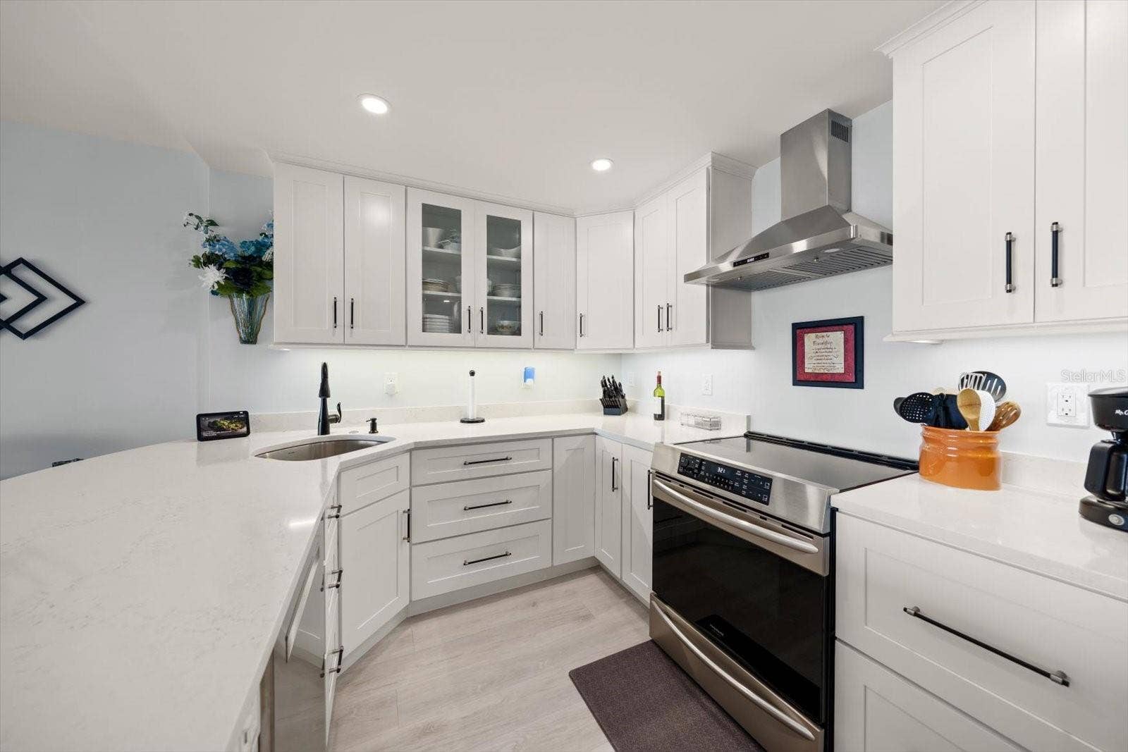 Well appointed kitchen with oversized island; perfect for dining & entertaining.