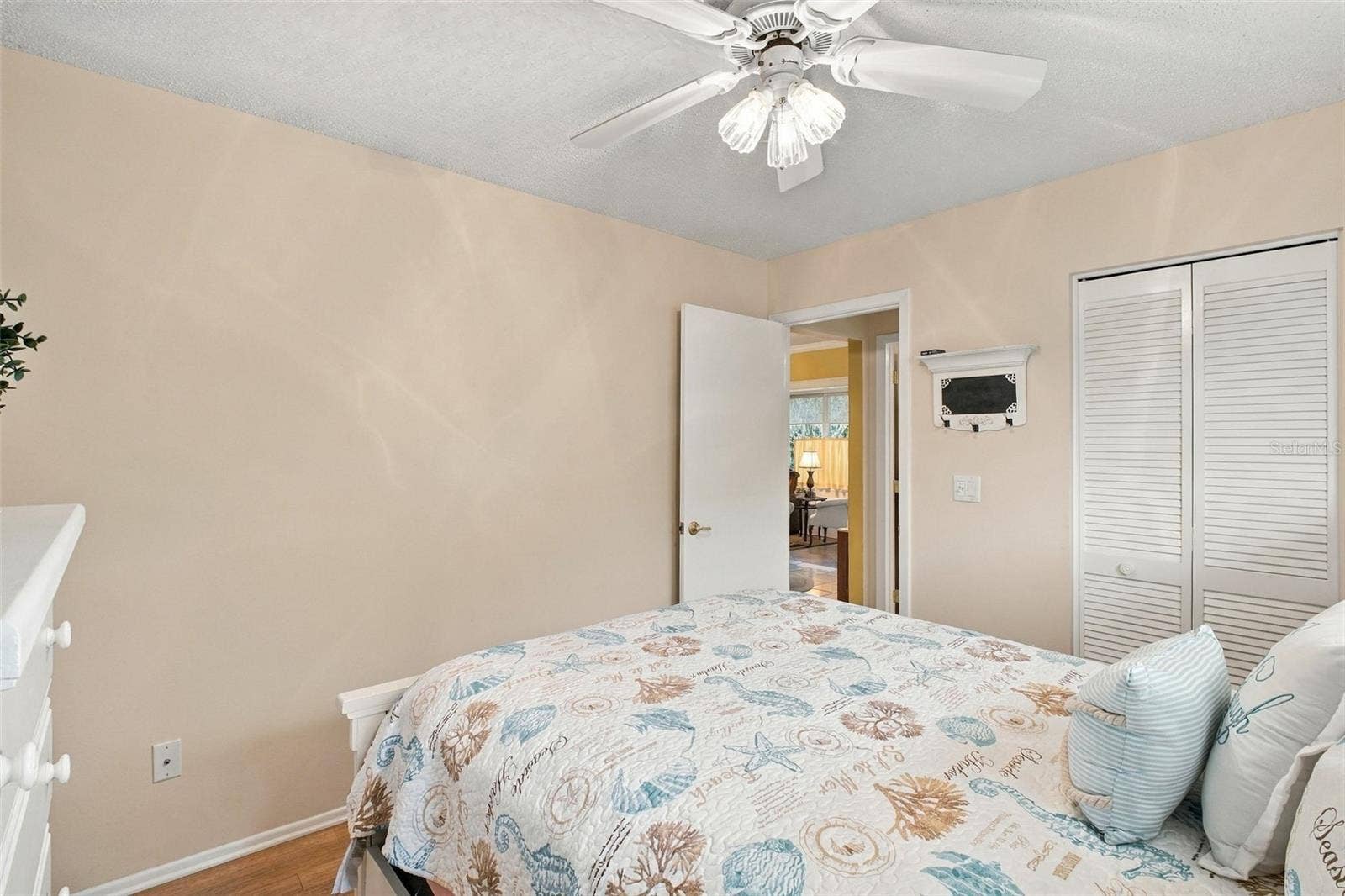 Large walk-in closet for abundant storage and perfectly located by the hall bath~