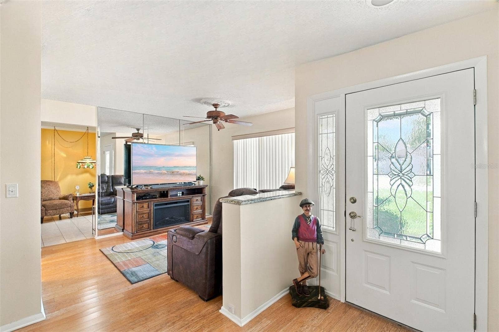 Living room conveniently tucked between the dining room & kitchen~