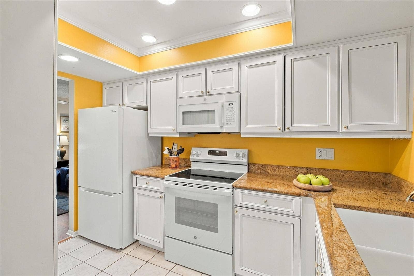 Beautiful tray ceiling with recessed lighting~