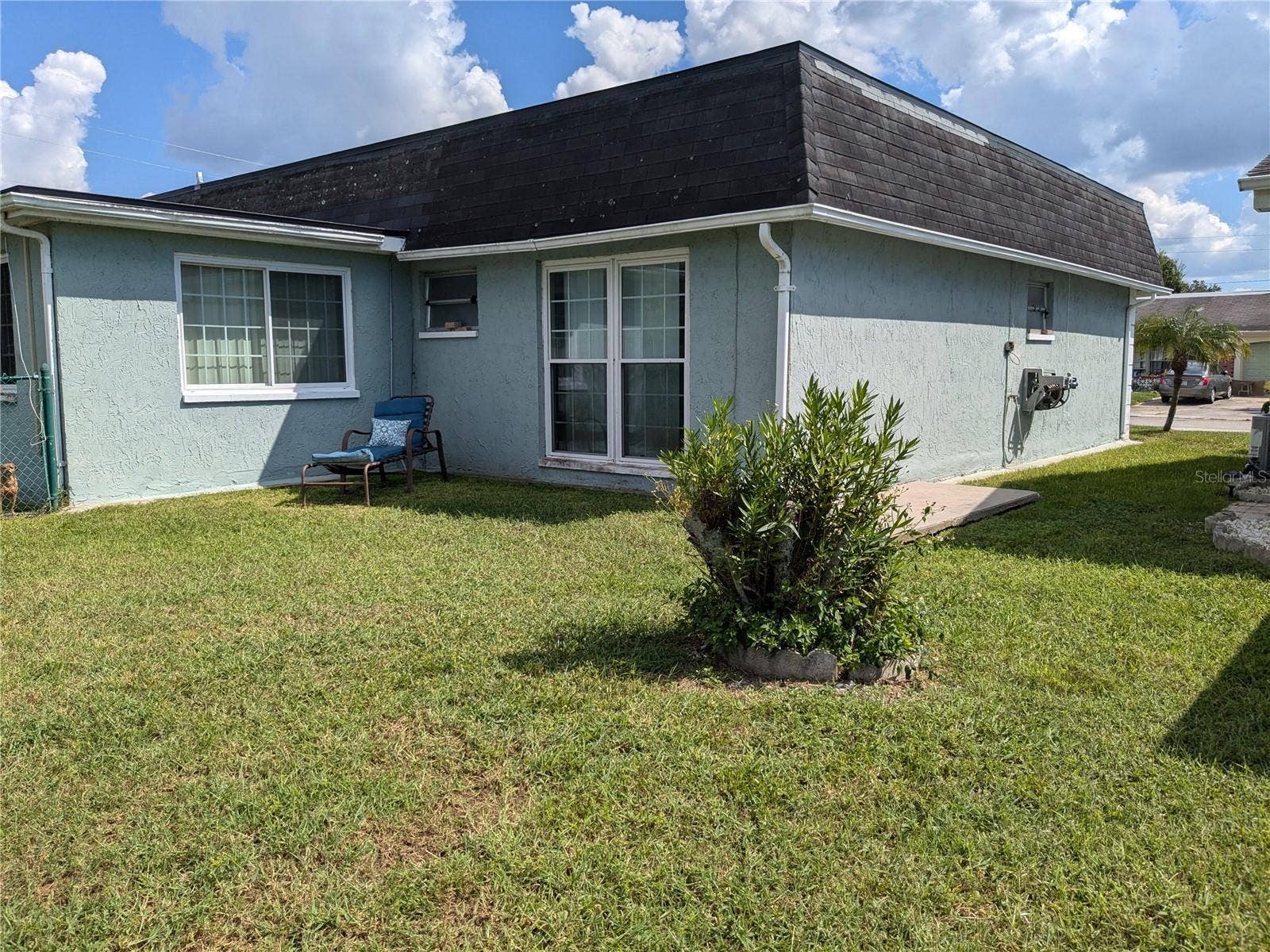 3937 SAIL DRIVE, New Port Richey, FL 34652 LEFT REAR OF HOUSE AND YARD