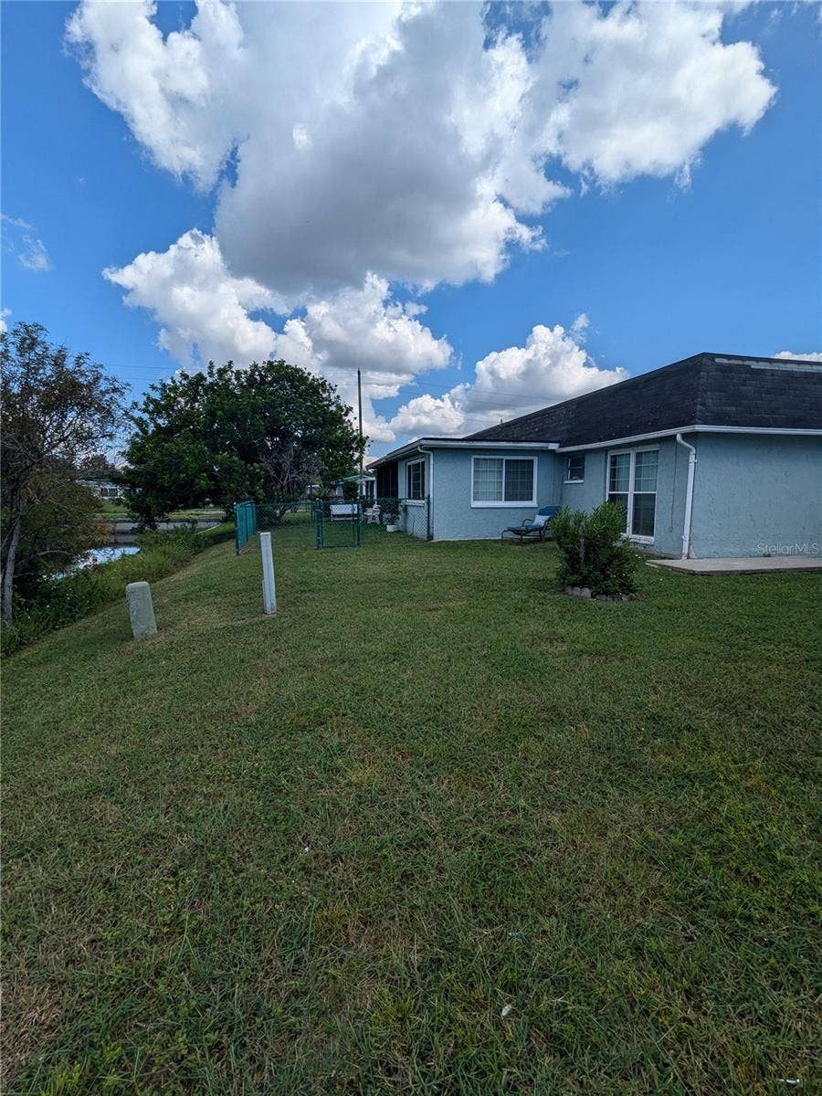 3937 SAIL DRIVE, New Port Richey, FL 34652 REAR YARD ABUTTING CANAL N LEFT