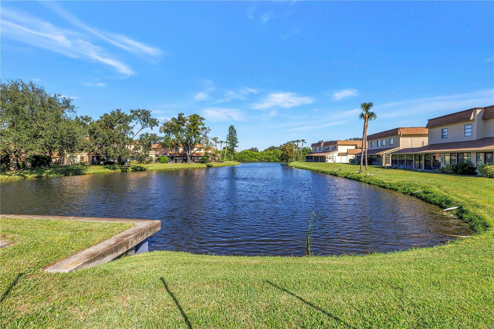 8473 17TH STREET N, St Petersburg, FL 33702 Located on scenic Cinnamon Lake