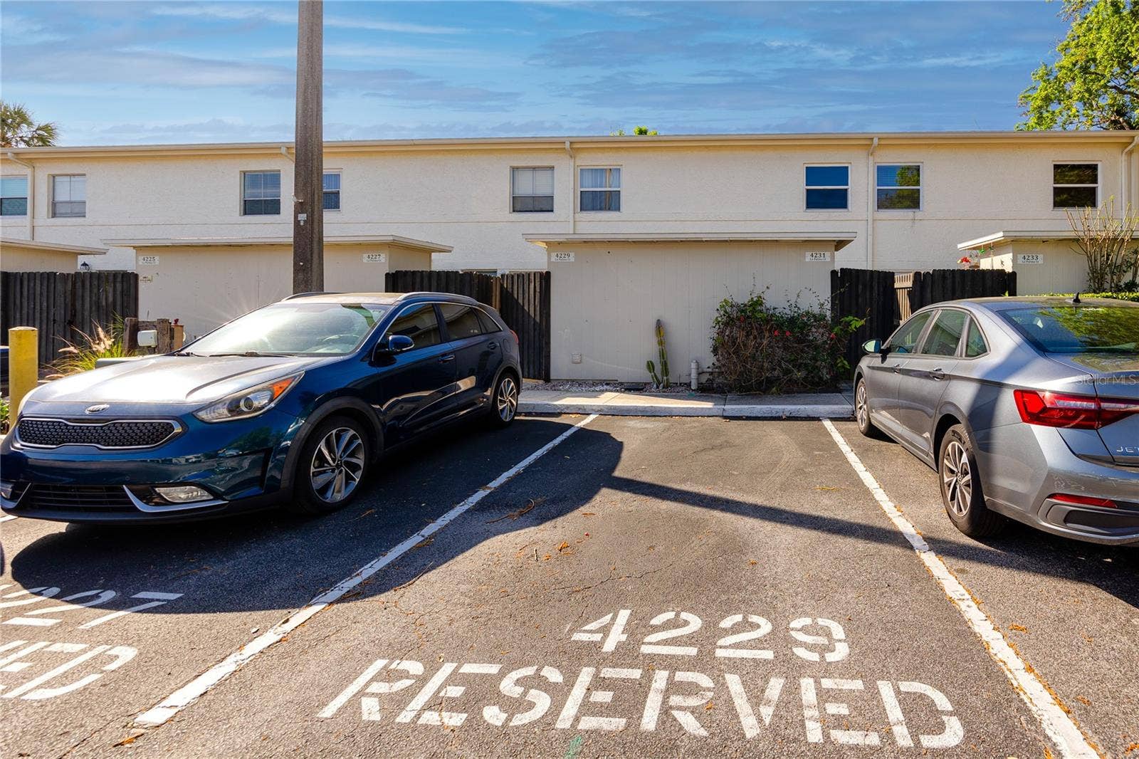 4229 LA PALMA COURT, Tampa, FL 33611 Assigned parking space just outside the unit.