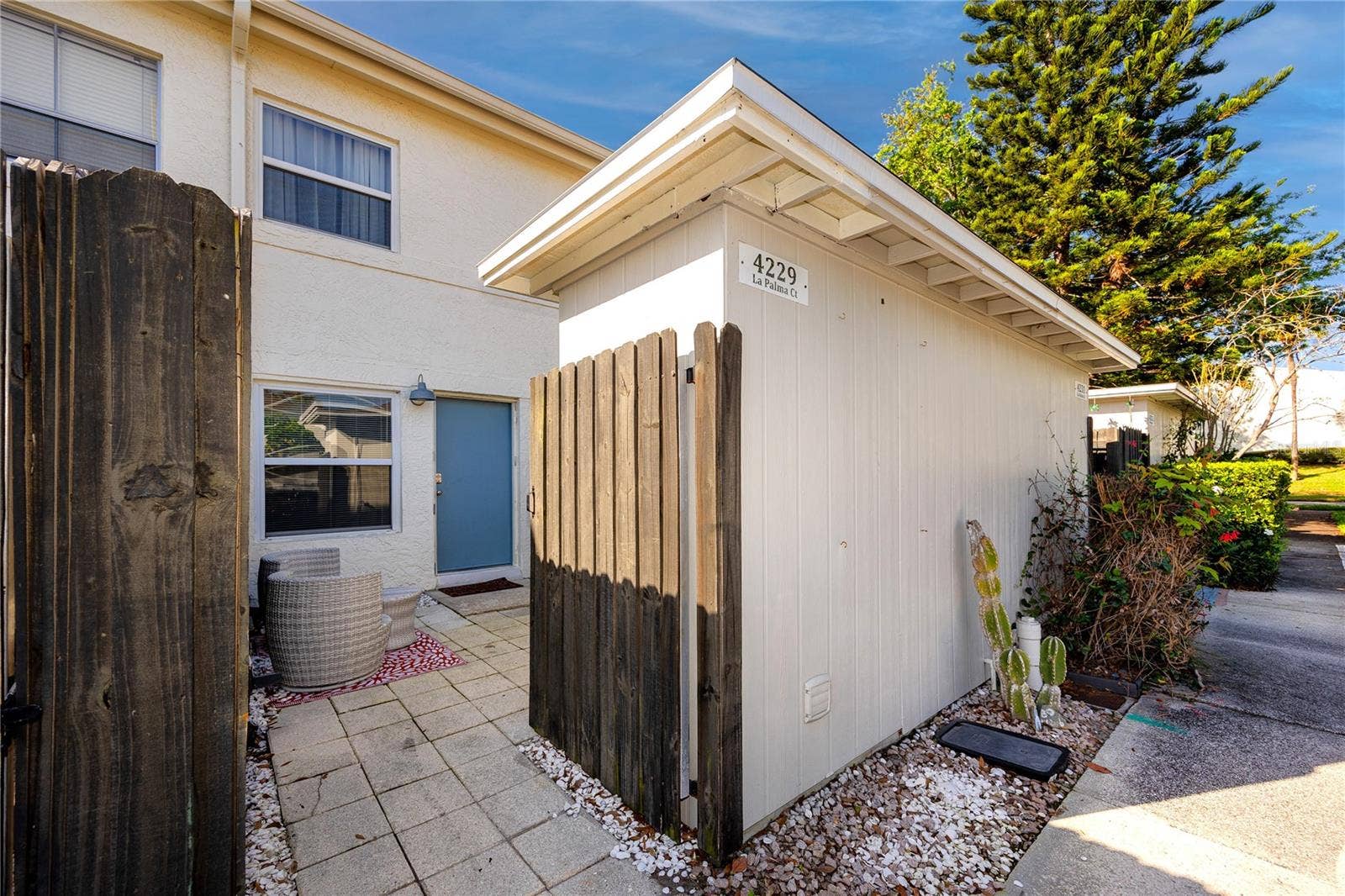 4229 LA PALMA COURT, Tampa, FL 33611 Private fenced back patio with storage closet.