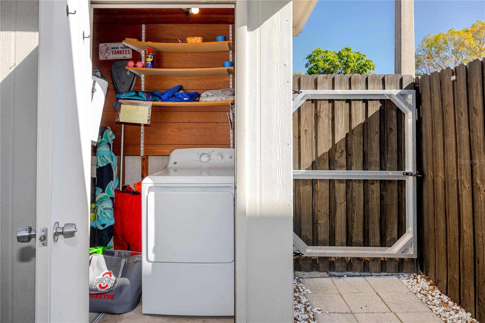 4229 LA PALMA COURT, Tampa, FL 33611 Storage closet with dryer