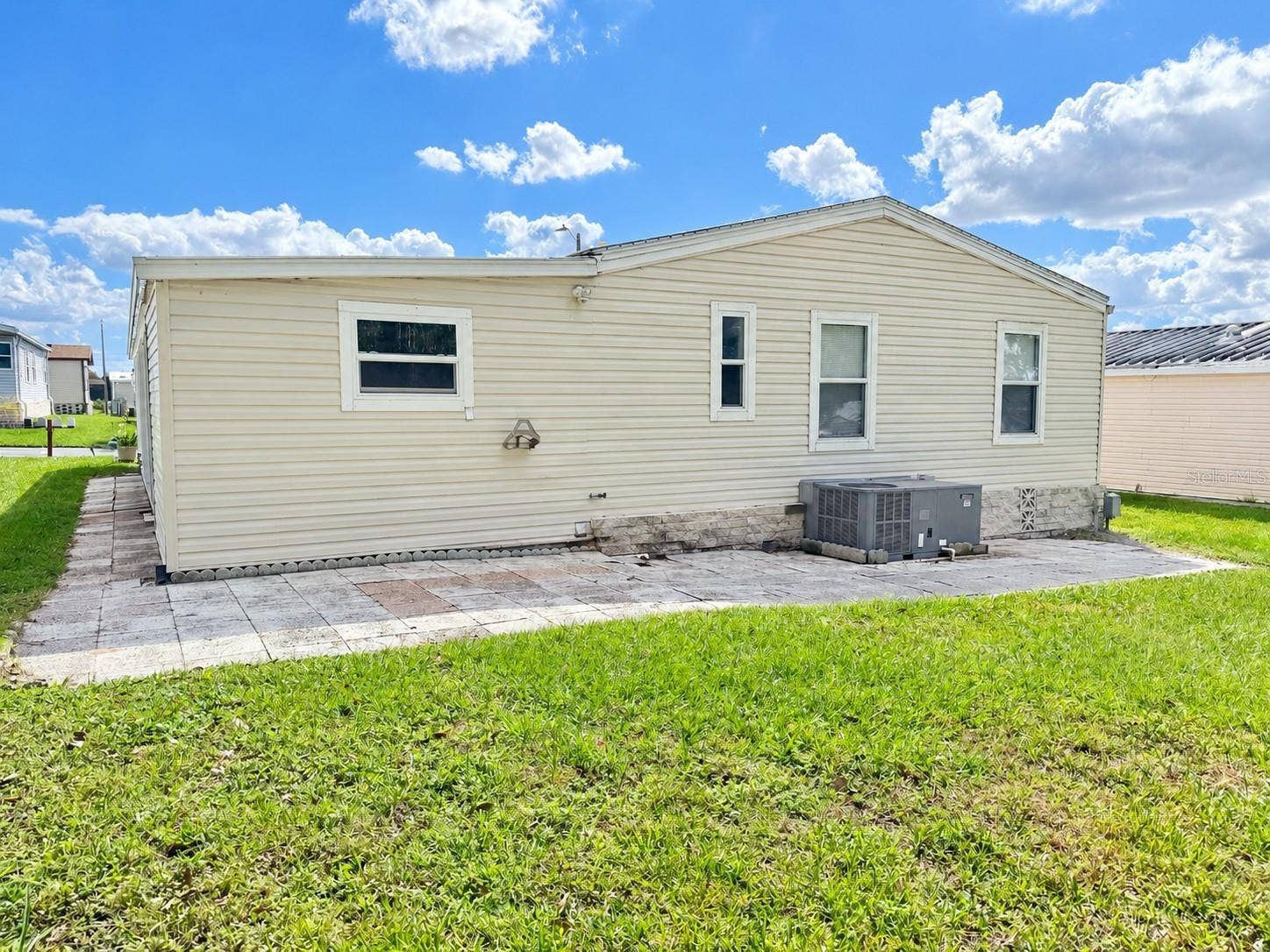 37631 CAMPO AVENUE, Zephyrhills, FL 33541 Back and Side View