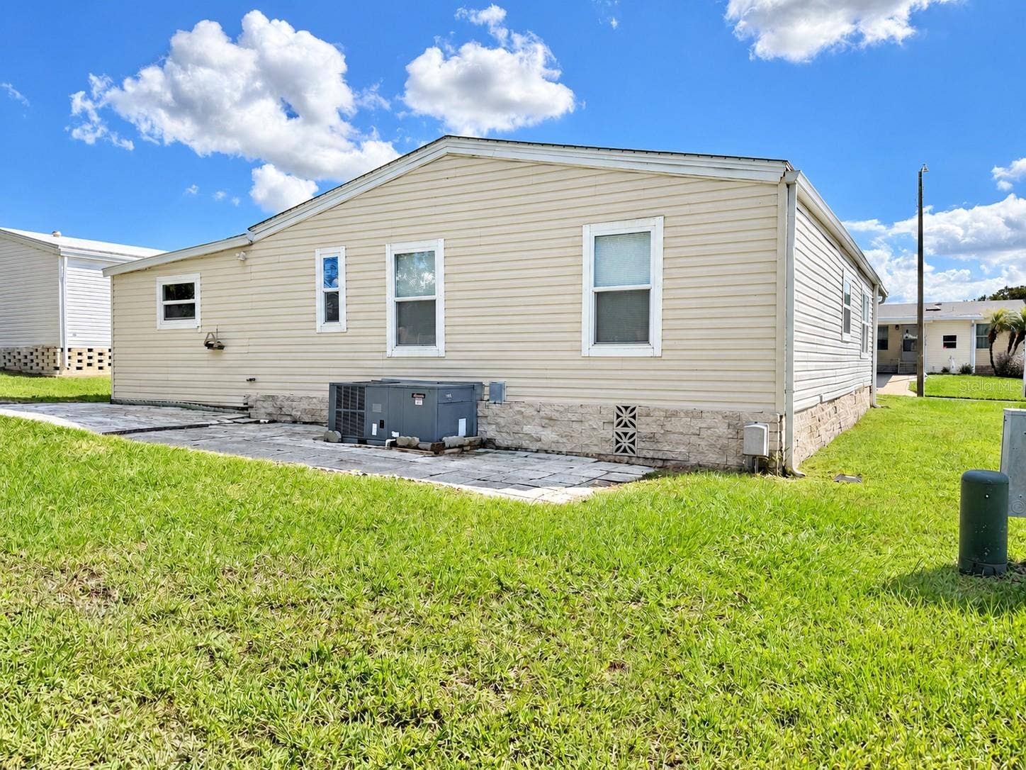 37631 CAMPO AVENUE, Zephyrhills, FL 33541 Back and Side View