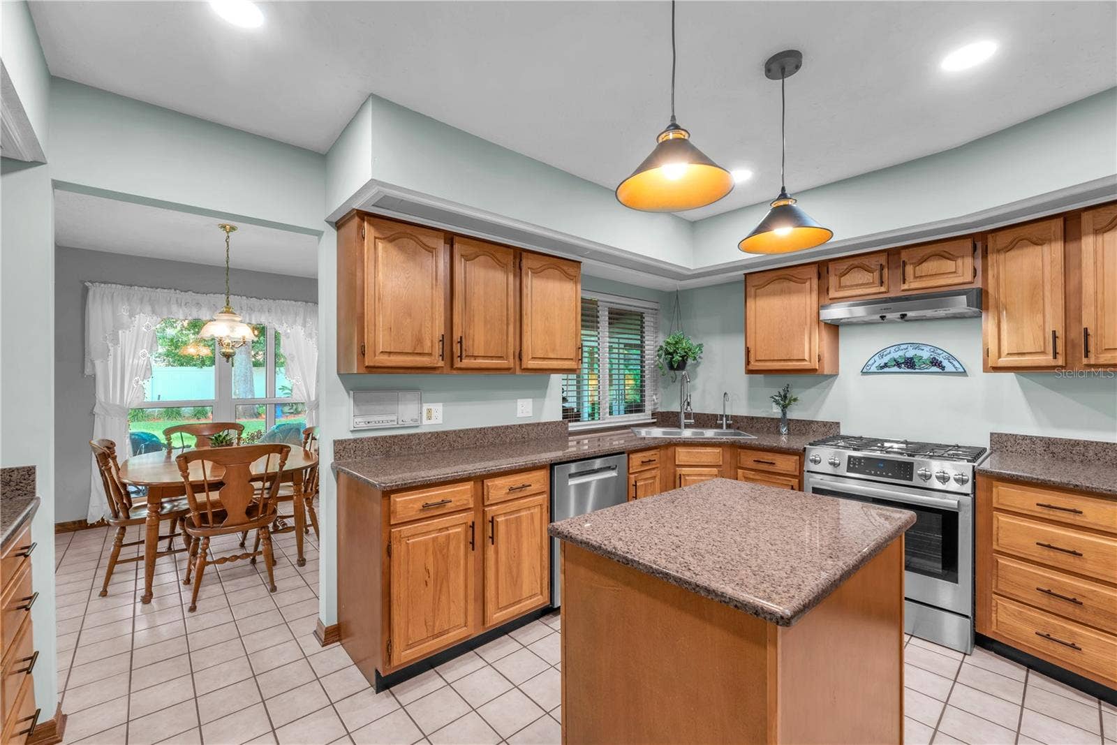 The kitchen features a thoughtfully designed, efficient layout that makes meal preparation easy and convenient.