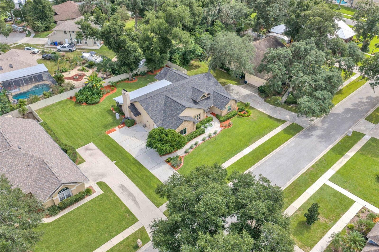 Birdseye view of Oak Landing Drive with optional low HOA fees and NO CDD fees.  This home offers an appealing combination of space, privacy and updates.