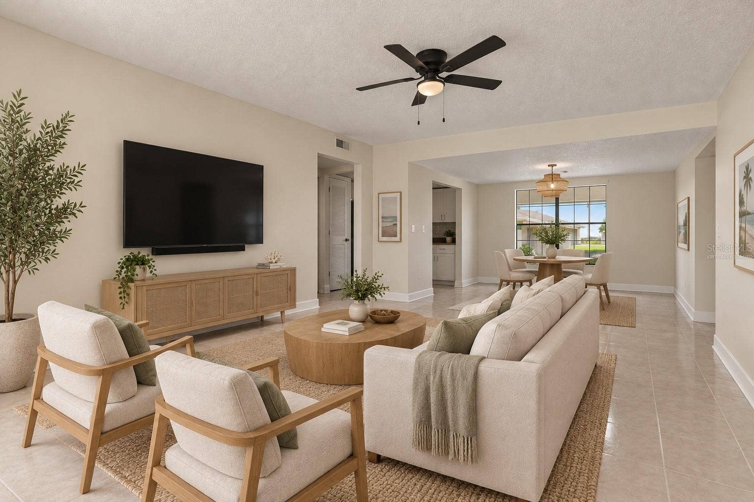 2460 HERON TERRACE, #102E, Clearwater, FL 33762 Virtually Staged - The Living Room is light, bright, and open with a lovely natural flow.