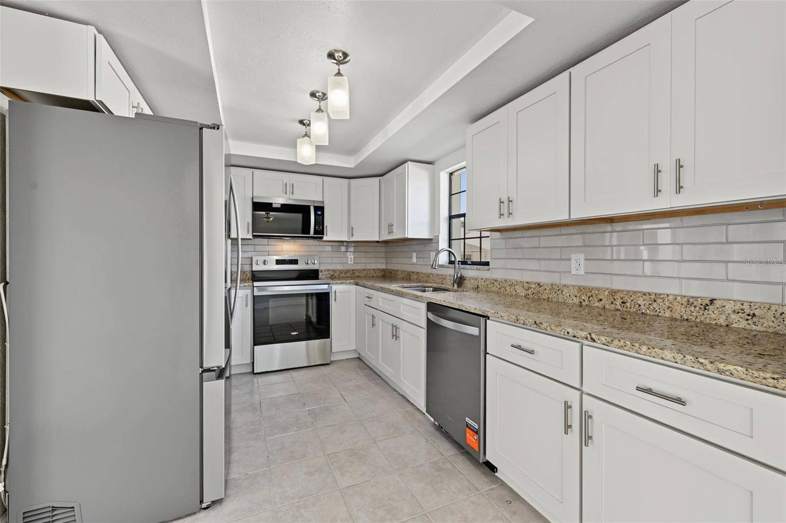 2460 HERON TERRACE, #102E, Clearwater, FL 33762 The Kitchen has ample storage and counter space.