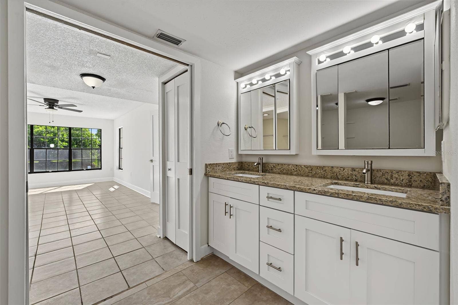 2460 HERON TERRACE, #102E, Clearwater, FL 33762 Updated Primary En Suite Bathroom