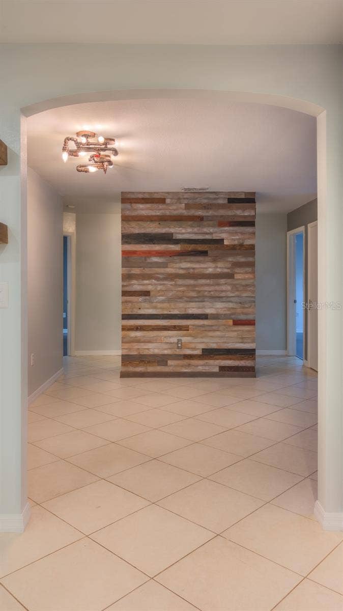7910 RIVERDALE DRIVE, New Port Richey, FL 34653 Wood accent wall in living room