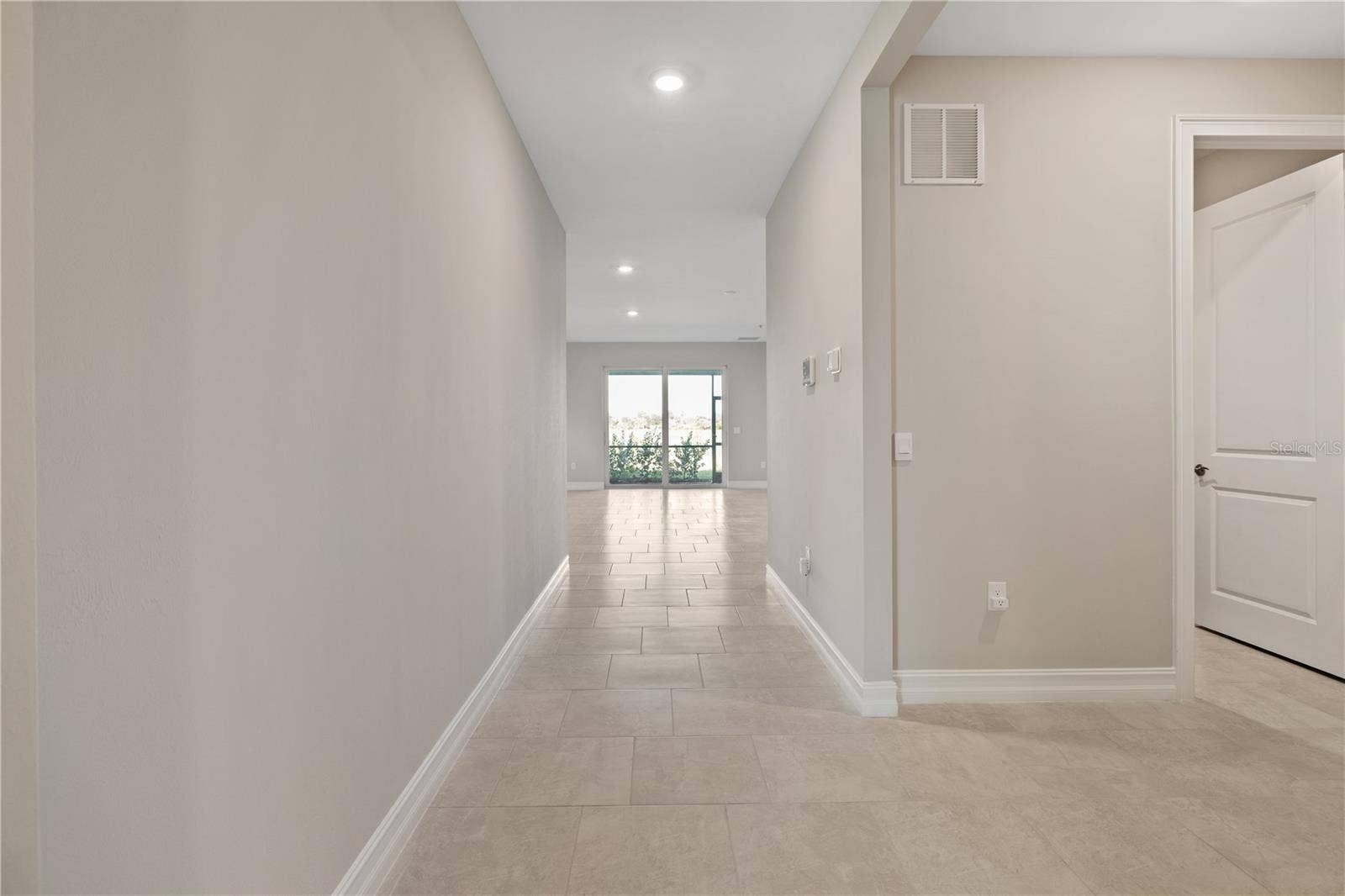 17740 SHADE TREE LOOP, Punta Gorda, FL 33982 Foyer leading into home.