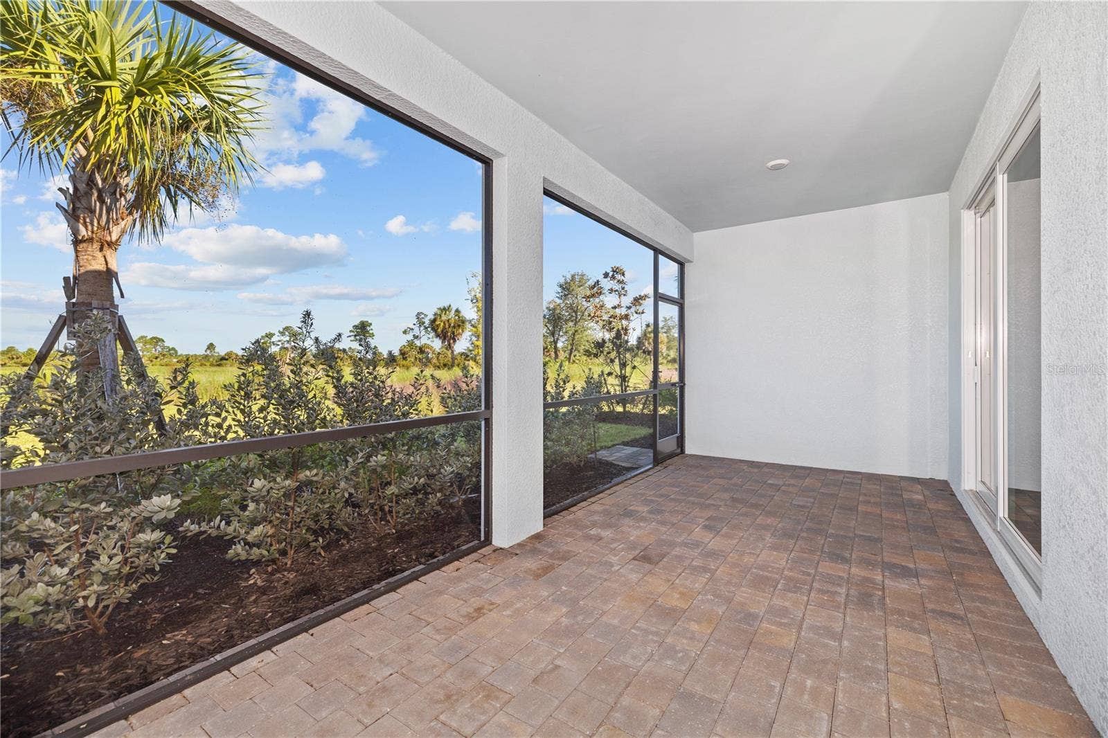 17740 SHADE TREE LOOP, Punta Gorda, FL 33982 Covered back porch with no backyard neighbors