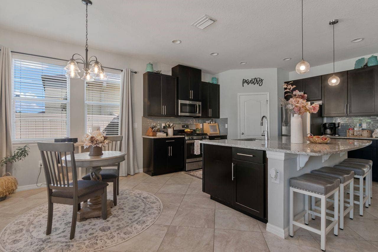 11143 SPRING POINT CIRCLE, Riverview, FL 33579 Breakfast nook or flexible dining area space.