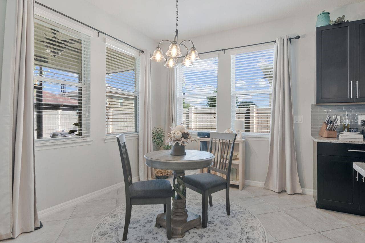 11143 SPRING POINT CIRCLE, Riverview, FL 33579 Plenty of room for bigger table if desired. Great natural light.