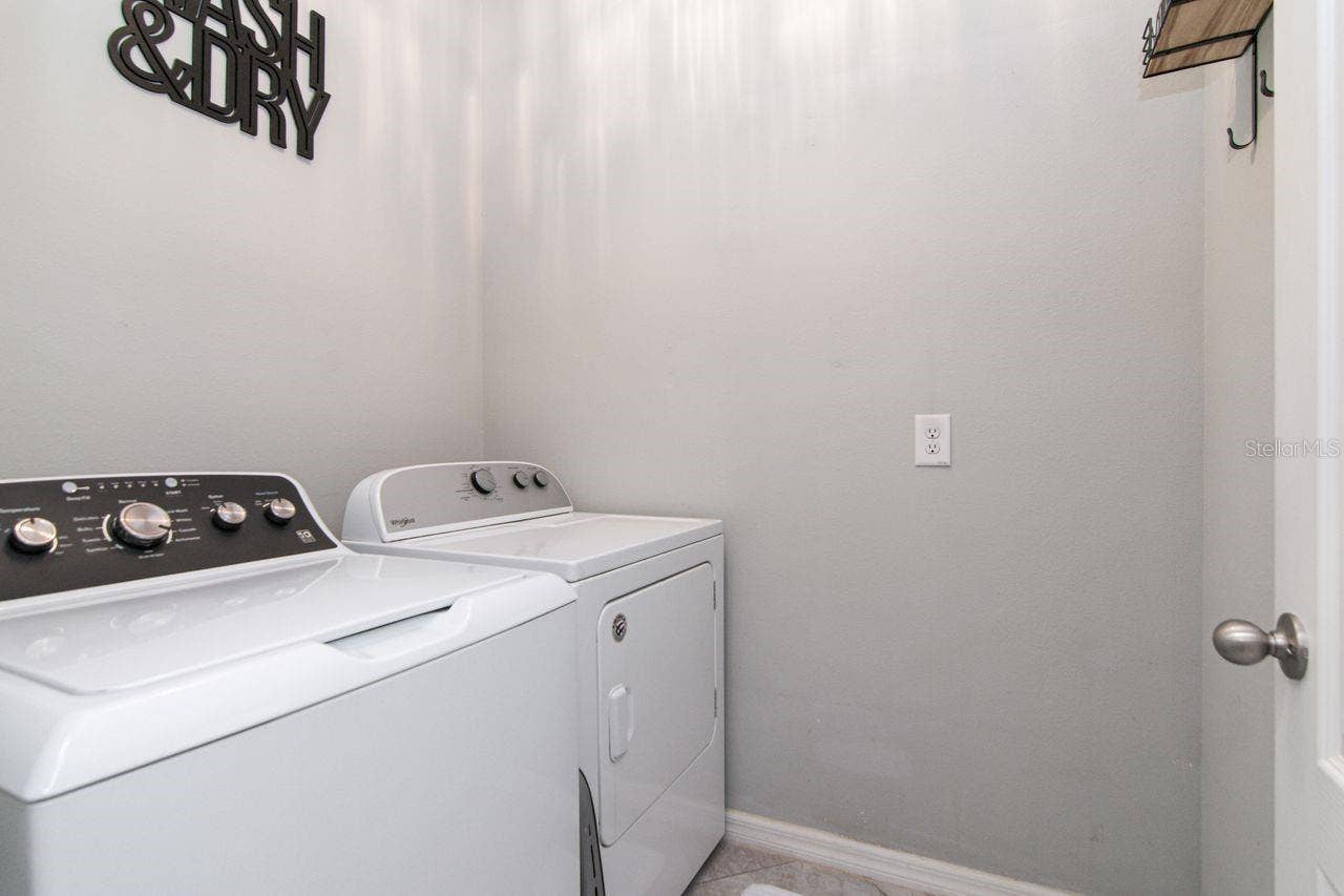 11143 SPRING POINT CIRCLE, Riverview, FL 33579 Separate Laundry room has small shelf