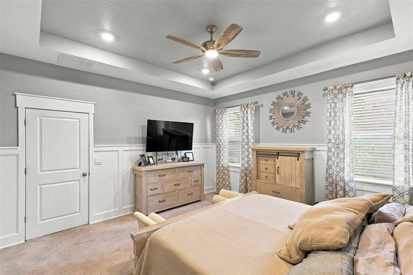 33310 MAJOR OAK DRIVE, Wesley Chapel, FL 33545 Primary Bedroom Featuring Tray Ceiling and Generous Living Space